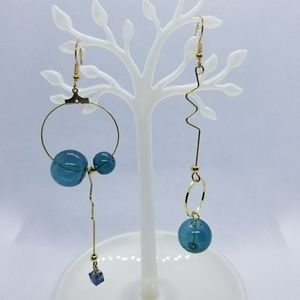 NWOT Boho assimetric earrings